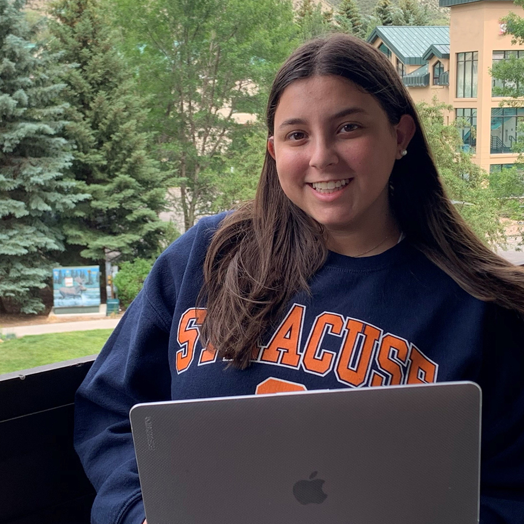 Syracuse University Summer College precollege student on a laptop