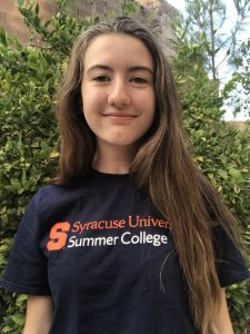 Syracuse University precollege aerospace student wearing a Summer College shirt
